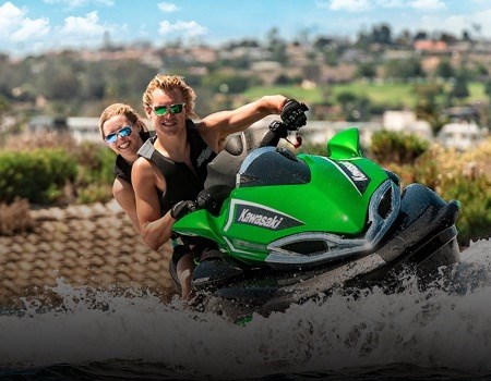 2 riders on a kawasaki jet ski